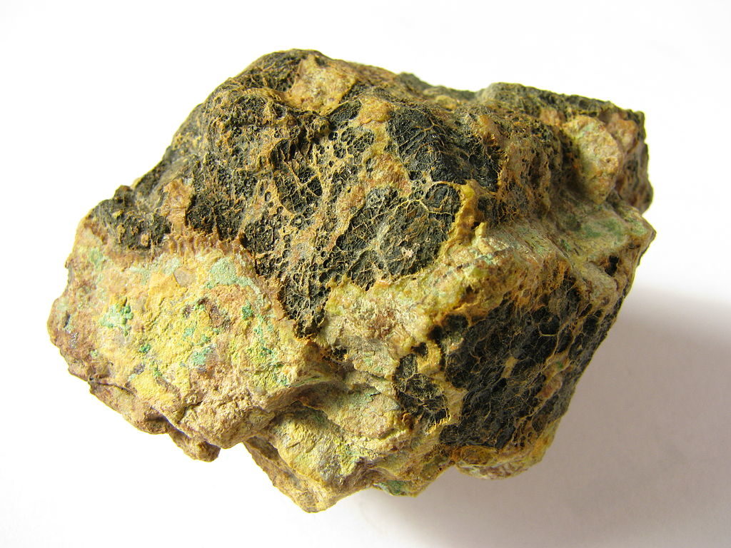 Pitchblende (black), or uraninite, is a major ore of uranium.