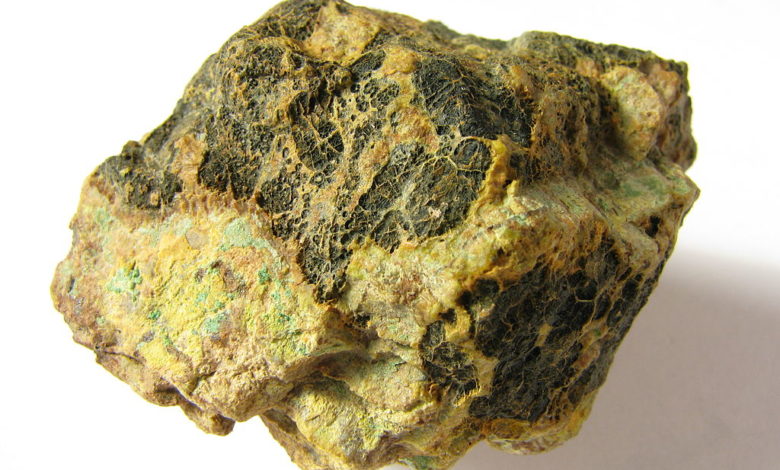 Pitchblende (black), or uraninite, is a major ore of uranium.
