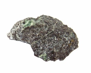 Chromite in a rock sample. The dark coloured chromite is a chromium-iron oxide and is typically associated with high temperature, deep-sourced rocks which may also host nickel, copper, vanadium and platinum group metals (PGMs). Unfortunately, the Ring of Fire rocks only host trace amounts of PGM's.