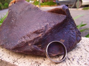 A jasperoid is a red-purple coloured rock composed of fine grained iron-rich quartz. CC