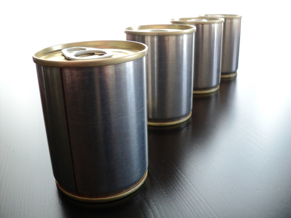 Tin cans are composed mainly of steel with a thin coating of tin.